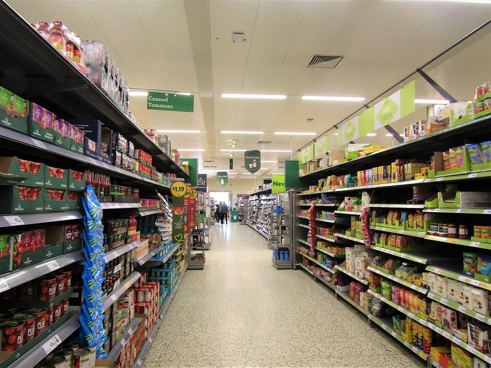 An aisle inside a Morrisons supermarket in Cromer, Norfolk, stocked with canned tomatoes and groceries