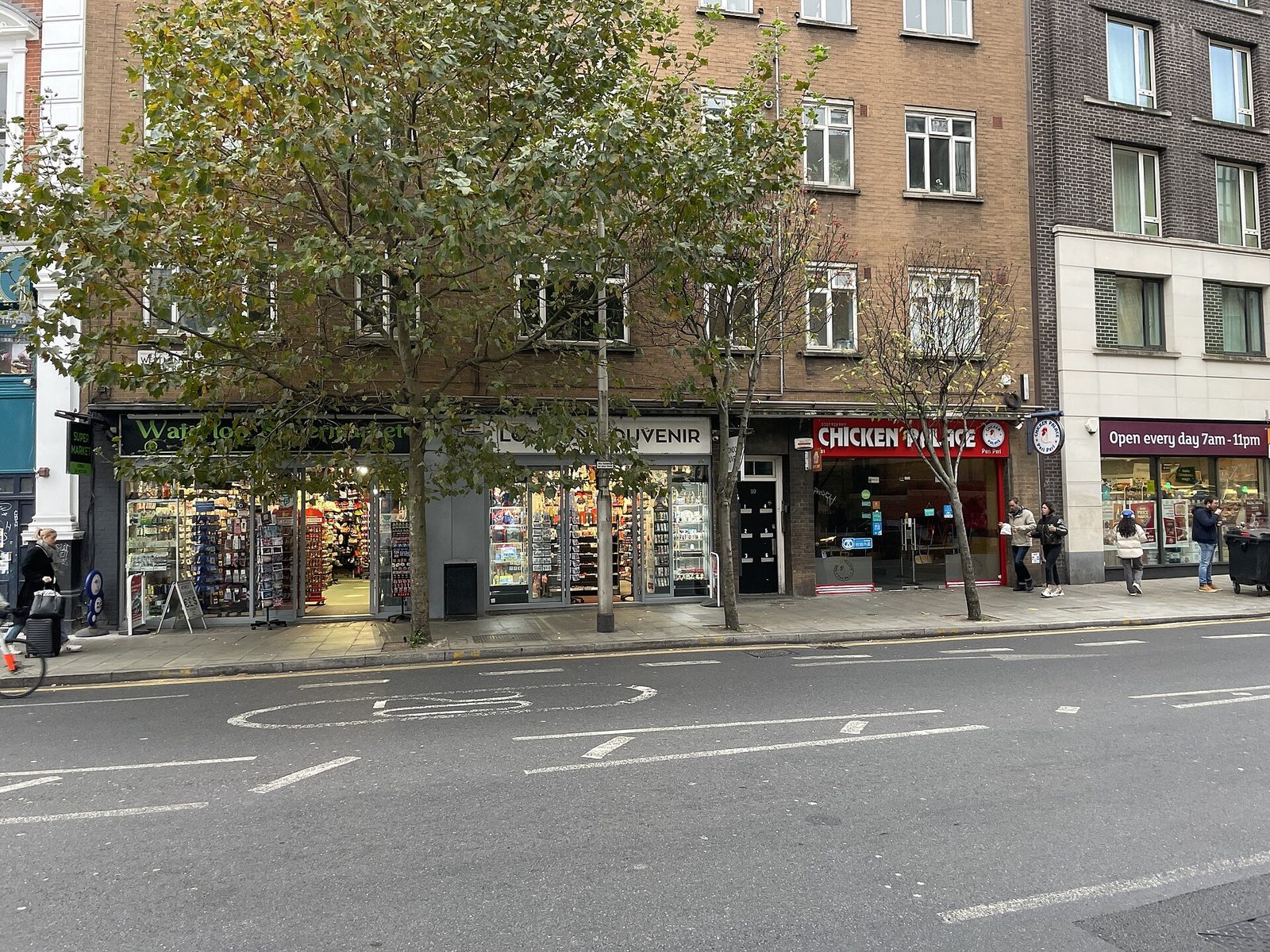 Local shops on Westminster Bridge Road in Lambeth, London, including a supermarket, a souvenir shop and a chicken restaurant