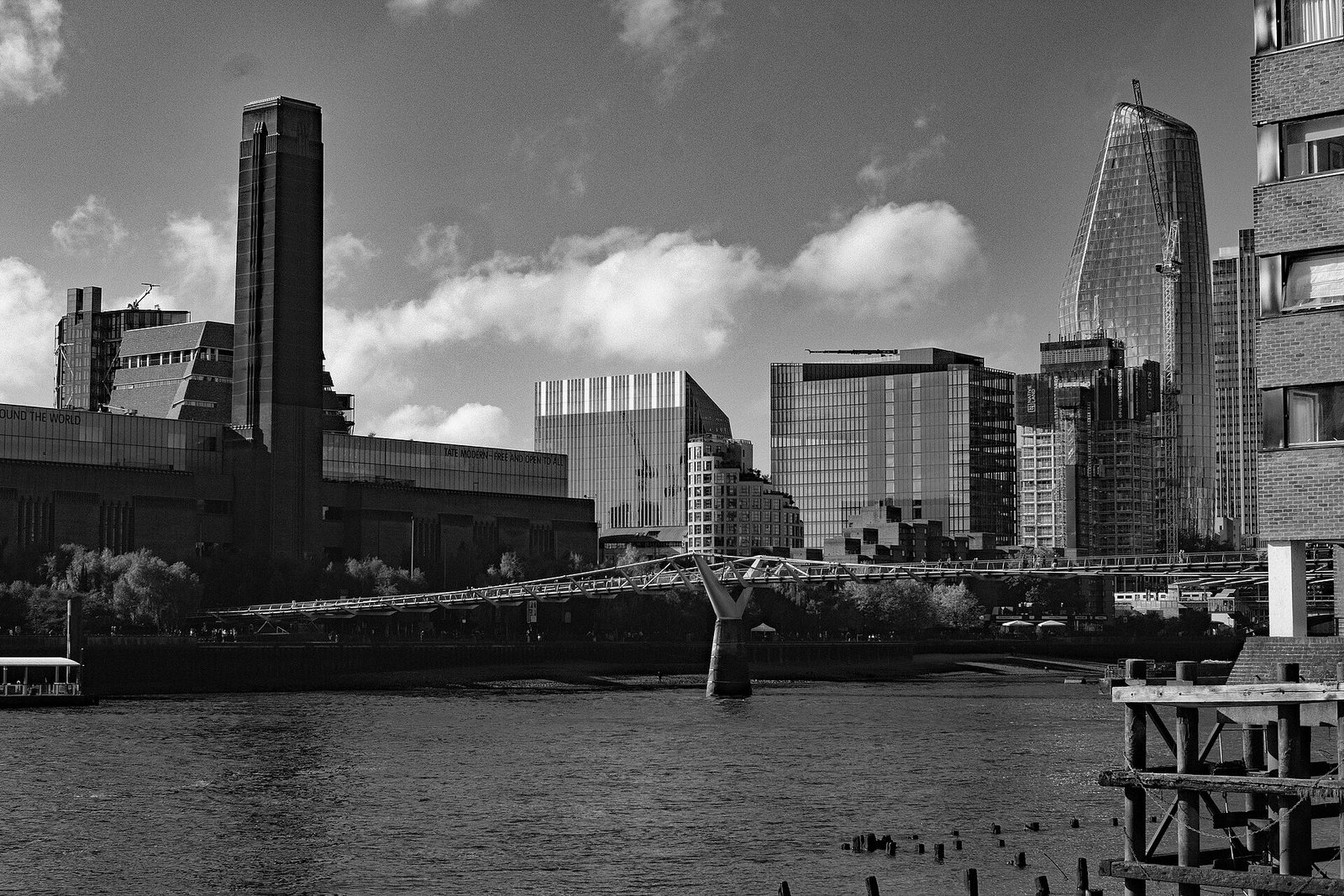 The River Thames and the Millennium Bridge in London, with Tate Modern on the south bank