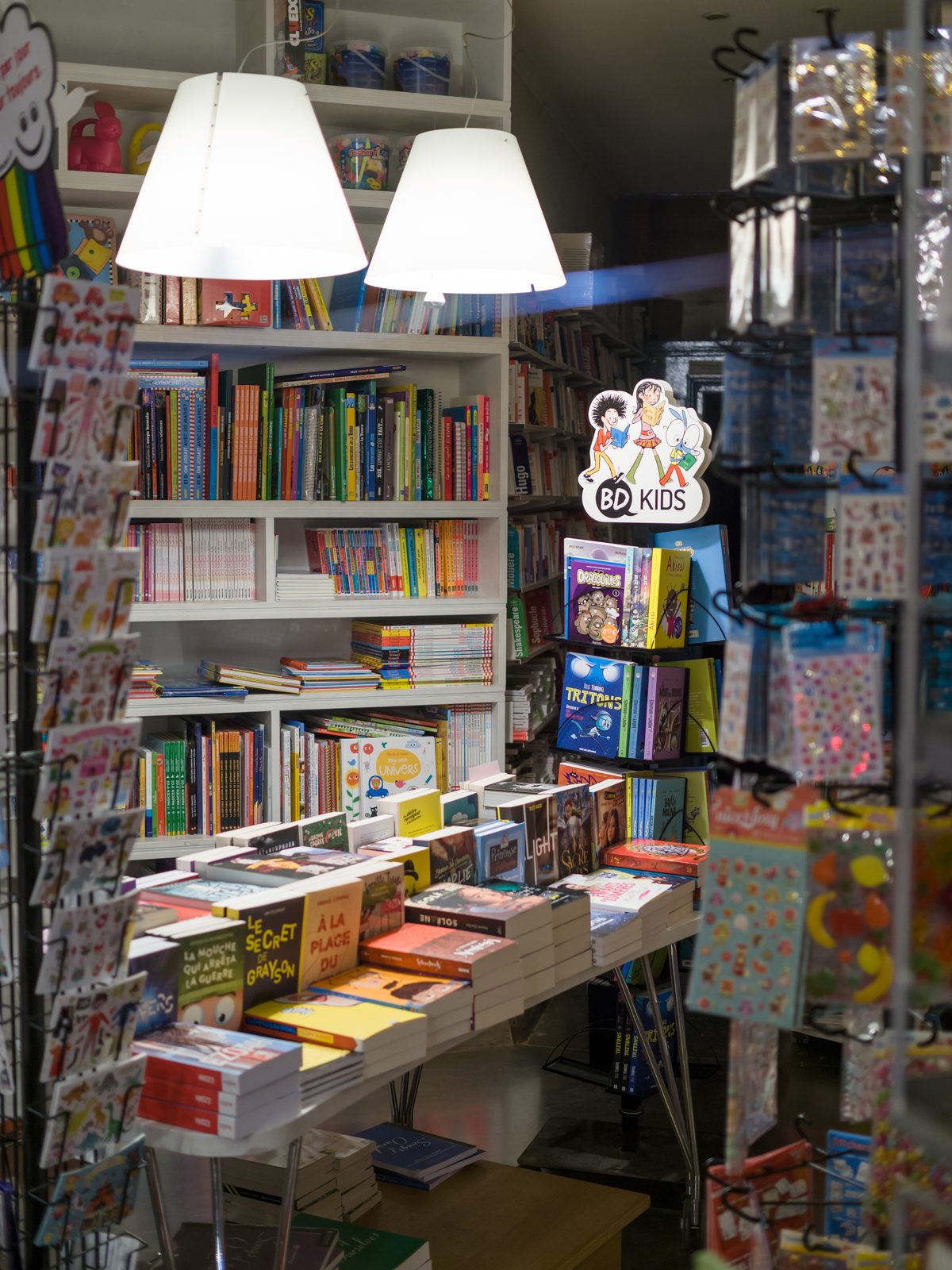 A bookshop interior by night