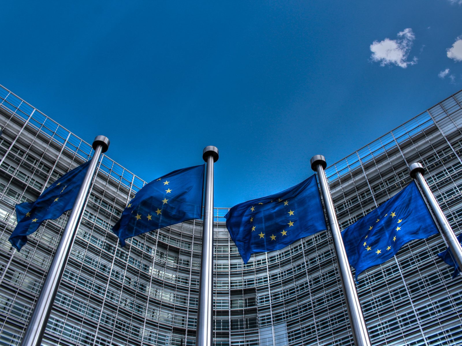 European Union flags flying outside an EU building