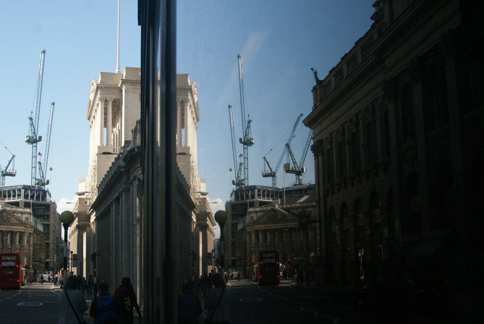 The Bank of England reflected in a neighbouring building on Threadneedle Street