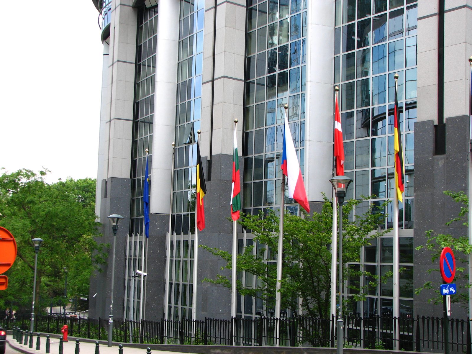 National and EU flags outside the European Parliament in Brussels