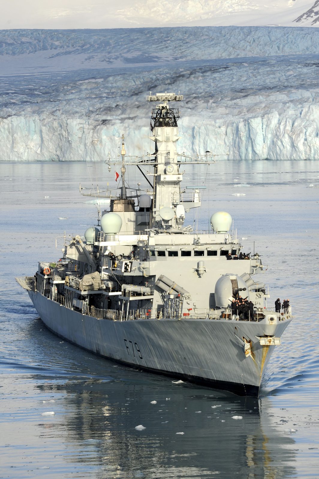 HMS Portland sailing near a glacier at South Georgia