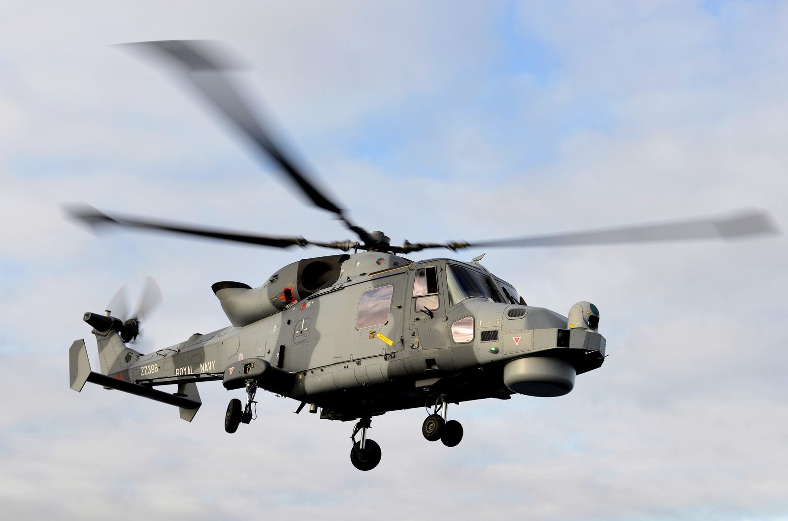 A Royal Navy Wildcat helicopter in flight